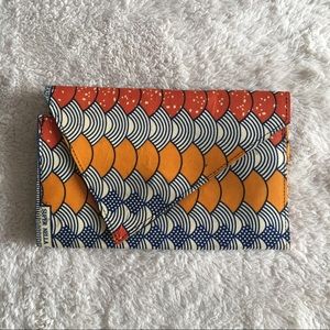 •Ankara Material Asymmetric midsize Clutch•